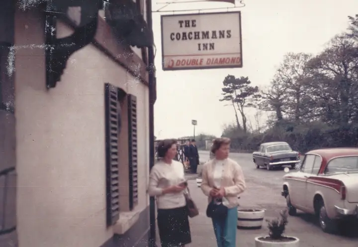 Photo of Myriam Oppermann and Evie Kraftchuck outside Coachmans Inn.