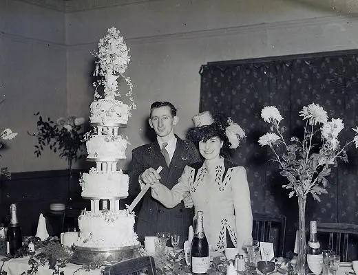 Wedding Cake made by her father Carl Rudolf, Cutting the Cake her father Carl Rudolf made,